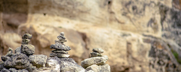 Balanced Zen stones on nature mountains background.
