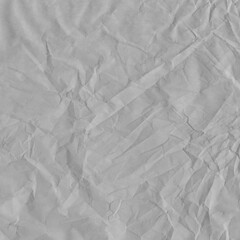 White vintage and old looking crumpled paper background. Retro cardboard texture. Grunge paper for drawing. Ancient book page. Present wrapping.