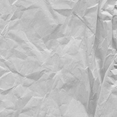 Fototapeta premium White vintage and old looking crumpled paper background. Retro cardboard texture. Grunge paper for drawing. Ancient book page. Present wrapping.
