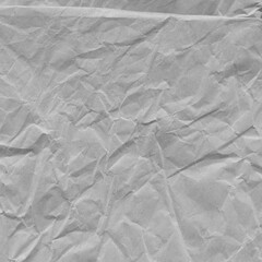 White vintage and old looking crumpled paper background. Retro cardboard texture. Grunge paper for drawing. Ancient book page. Present wrapping.