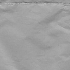 Obraz premium White vintage and old looking crumpled paper background. Retro cardboard texture. Grunge paper for drawing. Ancient book page. Present wrapping.
