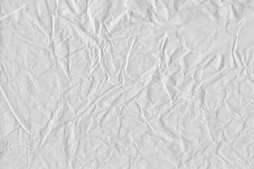 White vintage and old looking crumpled paper background. Retro cardboard texture. Grunge paper for drawing. Ancient book page. Present wrapping.