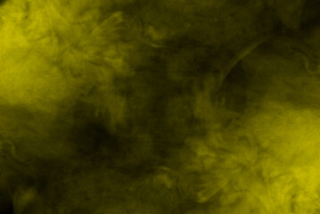Yellow steam on a black background.