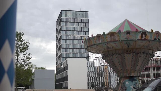 Munich, Germany. Werksviertel Mitte Streetart District an Carousel From Oktoberfest Beer Festival, Slow Motion View on Cloudy Day
