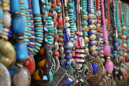 Jewellery, necklaces, accessories and ornaments at a street side shop in a bazaar