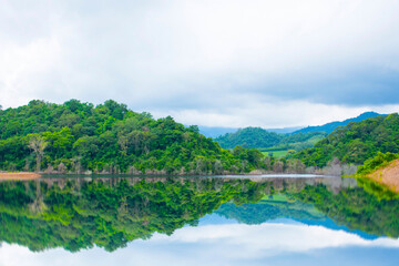 Reservoir in the valley with overcast sky and rain clouds in thailand