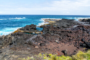 Azores, island of Sao Miguel, the natural lava rock pools Caneiros in the village of Mosteiros. 