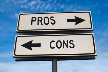 Pros and cons road sign, arrow on blue sky background. One way blank road sign with copy space....