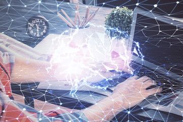 Man with computer background with brain theme hologram. Concept of brainstorm. Double exposure.