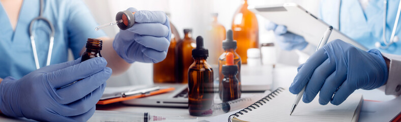 Medical technology concept The doctor works with mobile phones, headphones and tablets. Digital laptop in the modern office at the hospital in the morning