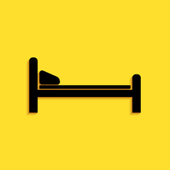 Black Hospital Bed icon isolated on yellow background. Long shadow style. Vector.