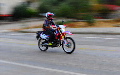 Obraz na płótnie Canvas Oludeniz,Turkey,20.10.2020: Red motorcycle racing on the track