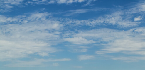 Beautiful blue sky with fluffy clouds