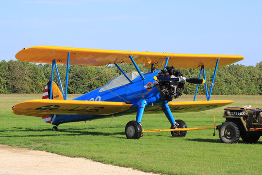 Biplane stearman pt 17 which takes off from an aerodrome. Used for aerial acrobatics because very manageable and lightweight. Cerny, France. October 13. 2019.