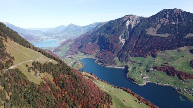 Amazing view to three different blue lakes in between a green valley in Switzerland (Lungernsee)