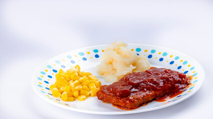 Delicious BBQ Rib TV dinner served on a plate
