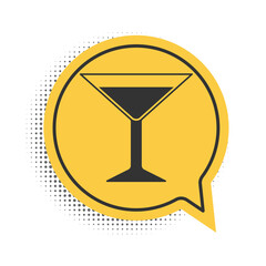 Black Martini glass icon isolated on white background. Cocktail icon. Wine glass icon. Yellow speech bubble symbol. Vector.