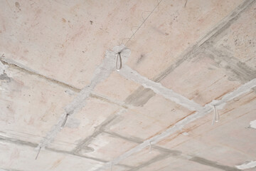 Installation hidden wiring for room lighting. External spots. Professional draft electrical wiring in house or apartment during repair. Concept distribution of electricity in apartment, safety