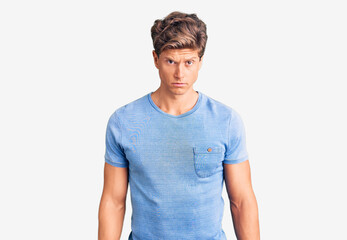 Fototapeta premium Young handsome man wearing casual clothes skeptic and nervous, frowning upset because of problem. negative person.