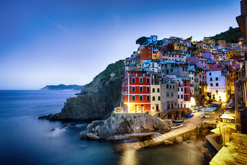 Fototapeta na wymiar Riomaggiore is one of the towns of Cinque Terre in the early morning. It is a UNESCO World Heritage Site. Colorful landscape, urban architecture of a small town. La Spezia, Liguria, Italy. 