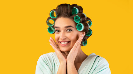 Pretty Lady With Hair Curlers Posing Over Yellow Background, Panorama