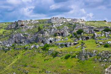 Watercolor drawing of View of ravine canyon with rocks and houses in caves di Murgia Timone near old ancient town Matera (Sassi), UNESCO World Heritage, Basilicata, Southern Italy
