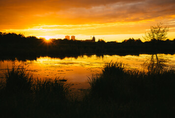 Obraz premium sunset over the river