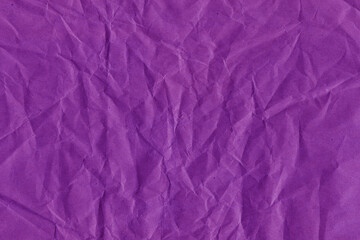 Violet vintage and old looking crumpled paper background. Retro cardboard texture. Grunge paper for drawing. Ancient book page. Present wrapping.