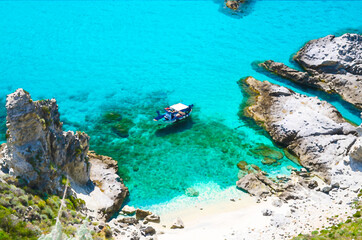 Watercolor drawing of Fishing yacht boat with shadows on bottom sail drift park in amazing tropical lagoon blue azure turquoise water of sea among rocks, cape Capo Vaticano Ricadi, Calabria, Italy