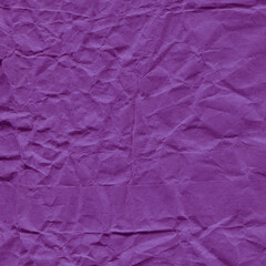 Fototapeta premium Violet vintage and old looking crumpled paper background. Retro cardboard texture. Grunge paper for drawing. Ancient book page. Present wrapping.