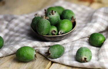 Feijoa fruit in a bowl.