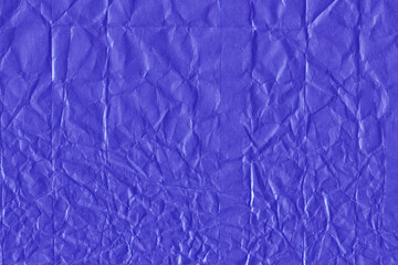 Violet vintage and old looking crumpled paper background. Retro cardboard texture. Grunge paper for drawing. Ancient book page. Present wrapping.