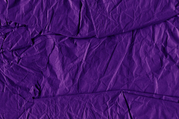 Violet vintage and old looking crumpled paper background. Retro cardboard texture. Grunge paper for drawing. Ancient book page. Present wrapping.