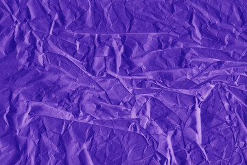 Obraz premium Violet vintage and old looking crumpled paper background. Retro cardboard texture. Grunge paper for drawing. Ancient book page. Present wrapping.