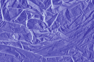 Obraz premium Violet vintage and old looking crumpled paper background. Retro cardboard texture. Grunge paper for drawing. Ancient book page. Present wrapping.
