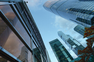 The exterior of the modern business skyscrapers in Moscow in summer day. Modern buildings of grew...