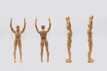 Set of Male dolls mannequin isolated on light background. Mannequin of man shows from four sides and holds hands up