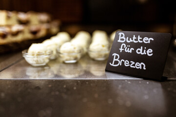 butter for local bavarian pretzel on a buffet