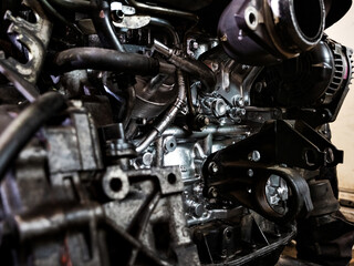 Repair the engine. Tools, oil, nozzles, cylinder block, painting, cleaning, diesel internal combustion engine for a car.