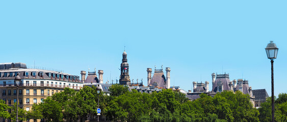 Fototapeta na wymiar Panoramic skyline view, street of the downtown of Paris, France. Hotel de Ville, old Neo-Renaissance City Hall