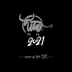 Fototapeta premium Year of the Ox on the Chinese calendar. Stylish new year card with metal bull on black background. Calligraphy symbol of the year 2021