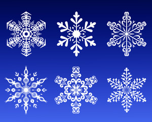 Set of white snowflakes on a blue background