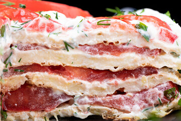A macro shot of sliced zucchini pie layers.