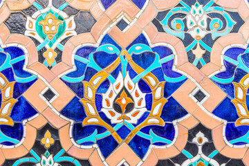 patterned ceramic mosaic on the wall