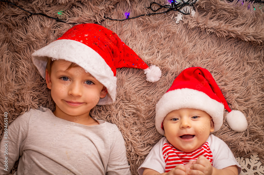 Wall mural kids in santa claus hats