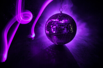 Colorful disco mirror ball lights night club background. Party lights disco ball. Selective focus