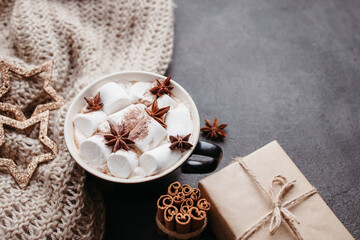 Obraz na płótnie Canvas Christmas background with hot chocolate and gifts