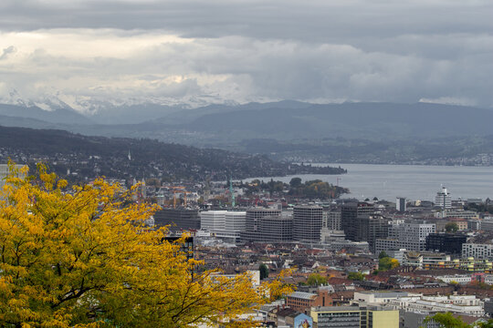 Cityscape of Zurich (Switzerland) with lake and mountain view on a cloudy and stormy day in autumn