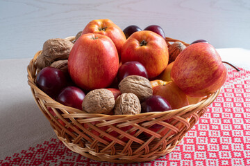 walnuts lie in a wooden dish