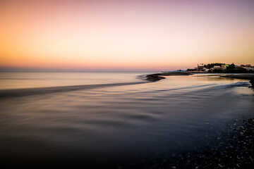 Fototapeta na wymiar Early sunrise on the seacoast